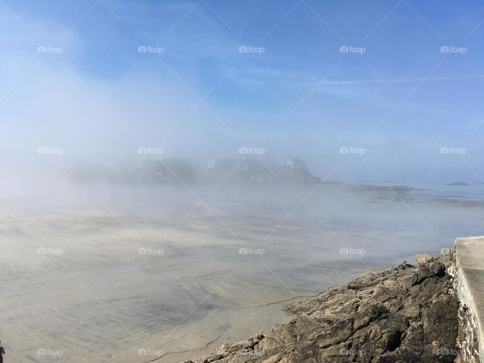 Coastline under fog
