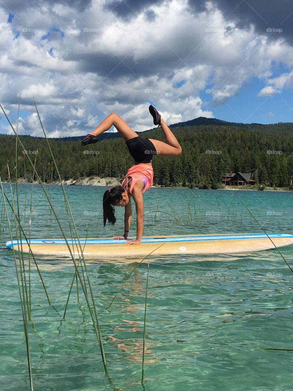 Gymnast on a paddle board 