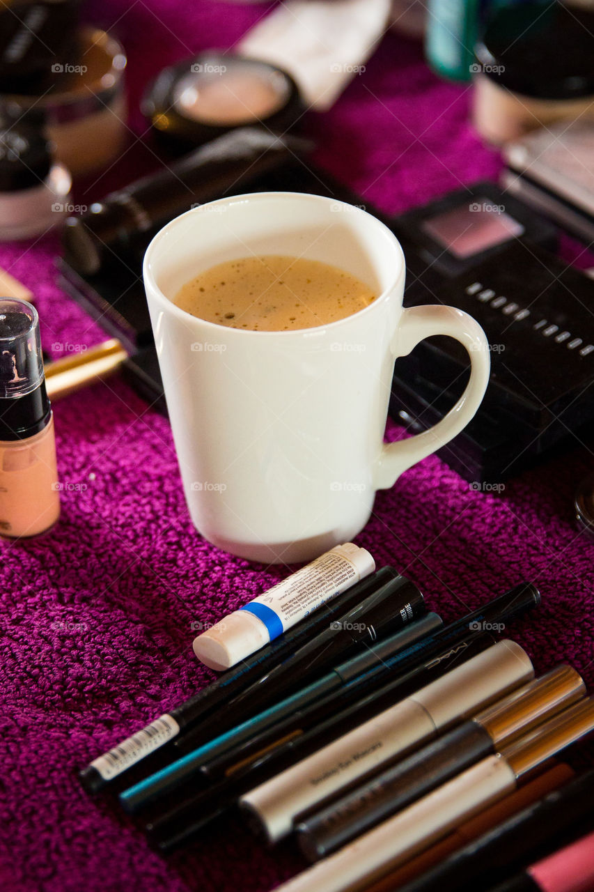 Coffee - early morning routine. Image of coffee and make up