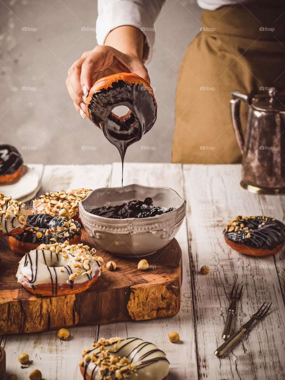 My friend bake amazing donuts.. They are beautiful and delicious! Chocolate donuts covered with nuts is always my favorite..