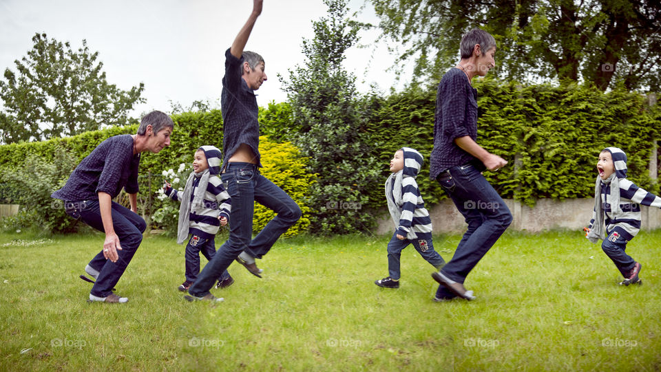 movement action composite photo of family having fun playing outdoors in the garden