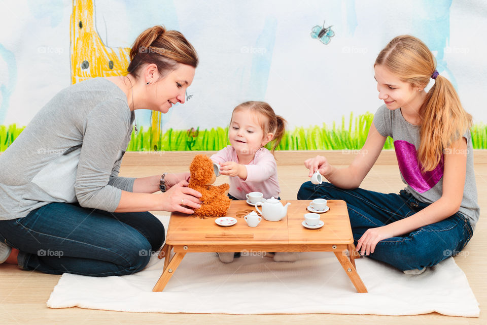 Mother playing with her daughter