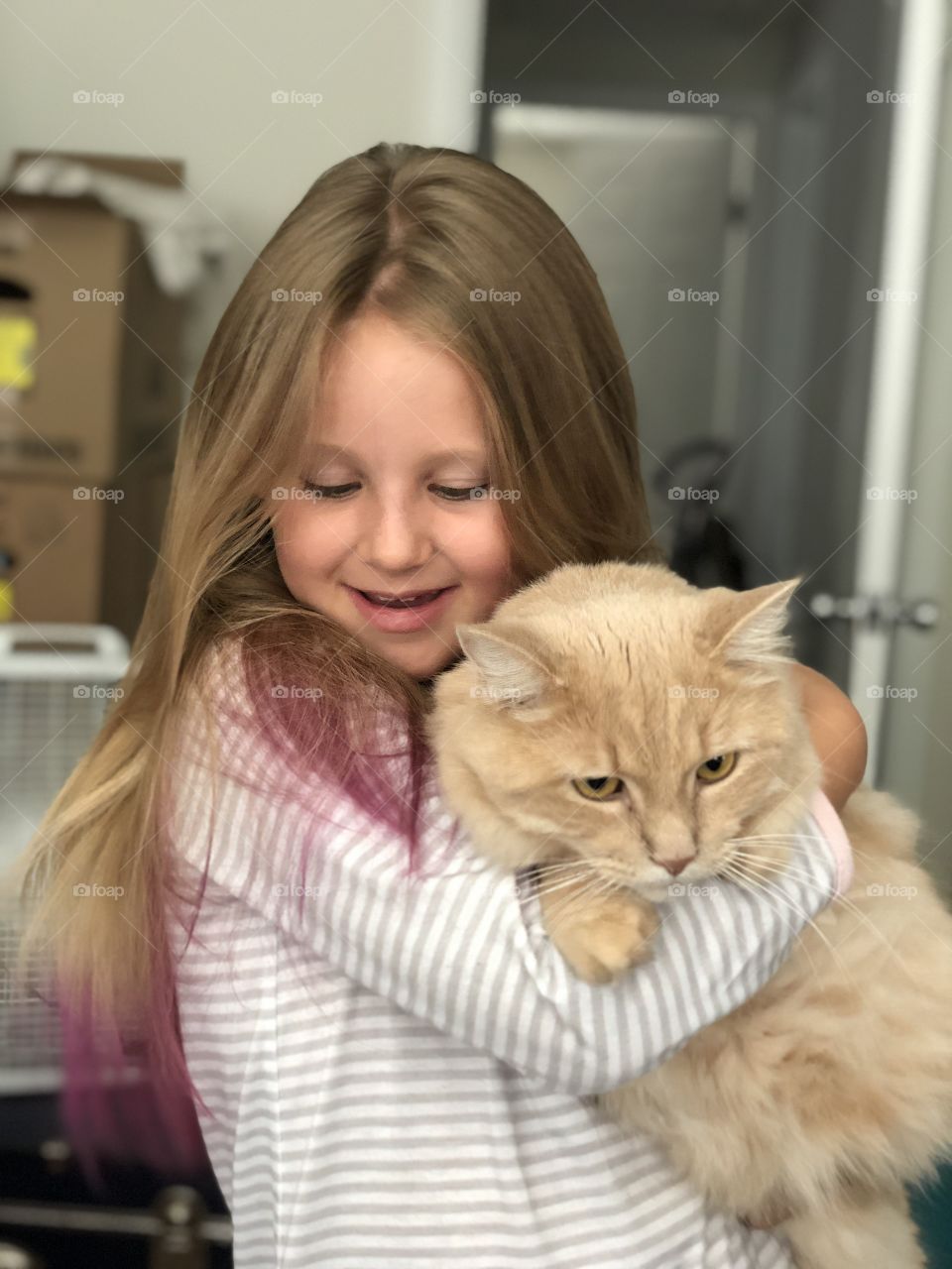 A kid and her cat