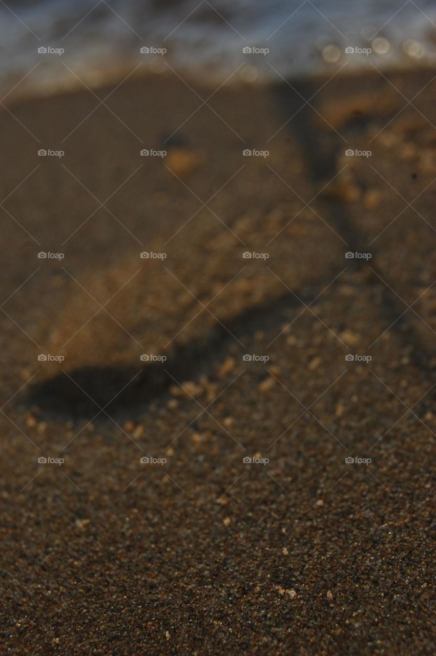 huella de pie en la arena