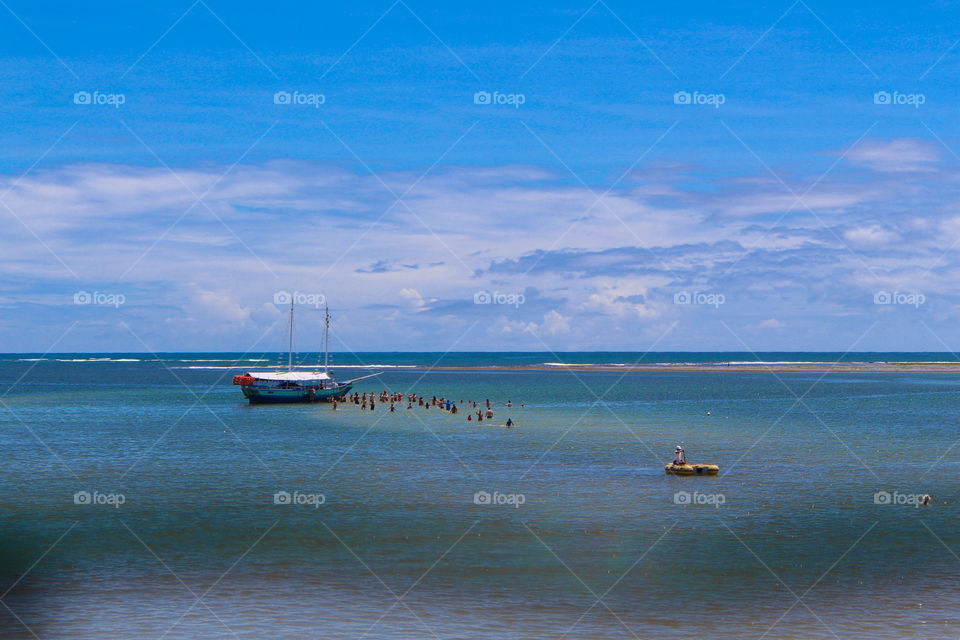 Tourists having fun in the Brazilian sea