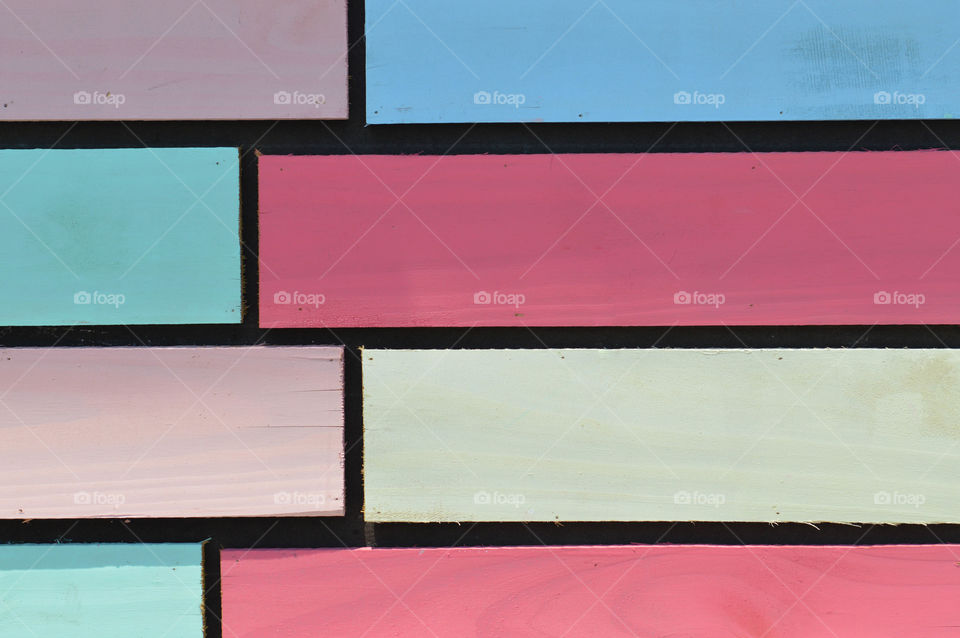 Close-up of a multicolored brick pattern wall