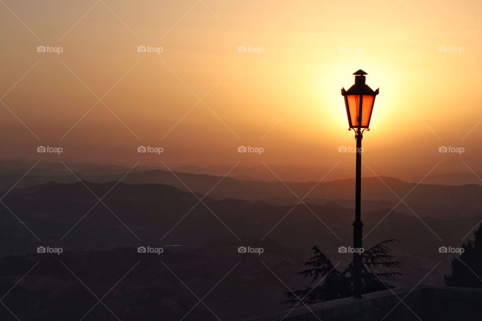 Lantern on sunset landscape view 