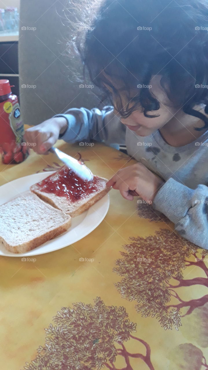 making a jam sandwich