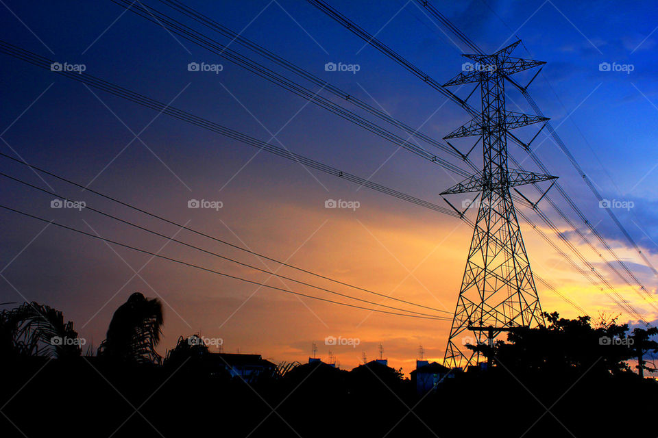 sunset with electric tower