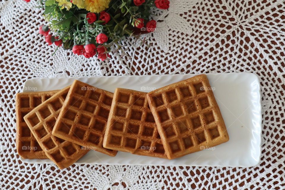 Belgian waffles on white background 