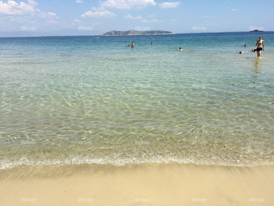 Crystal clear water at Glyfada beach on Thassos island in Greece