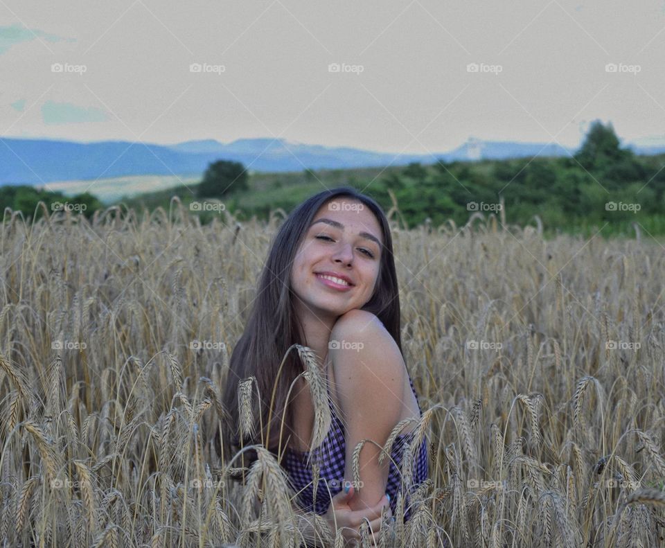 Happy girl in a field