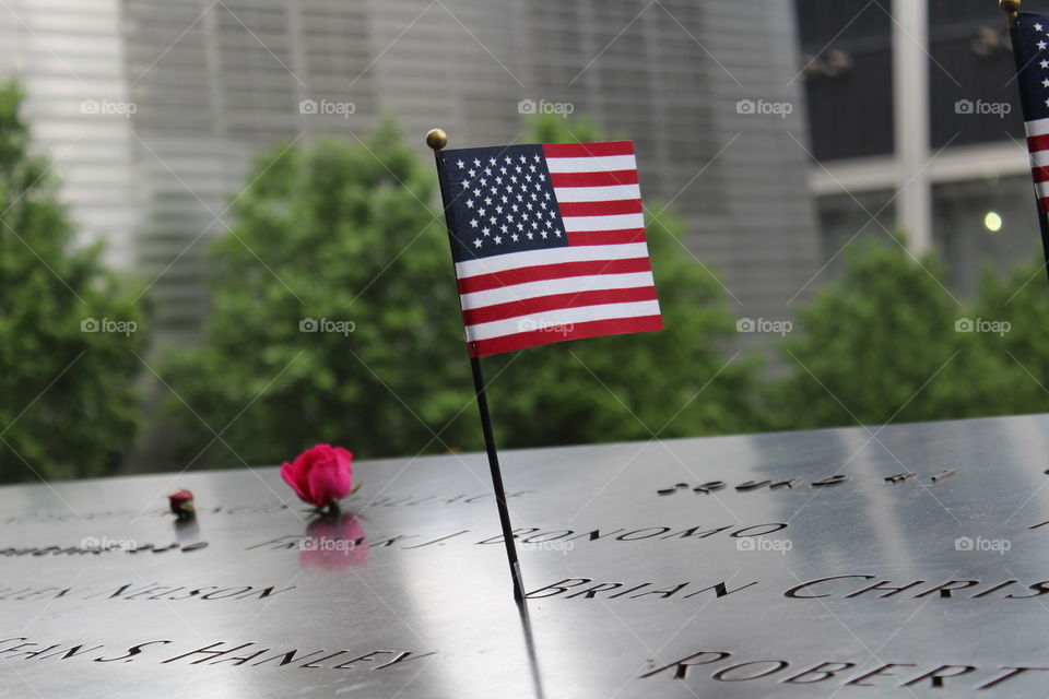 911 Memorial, USA flag with flower in the back