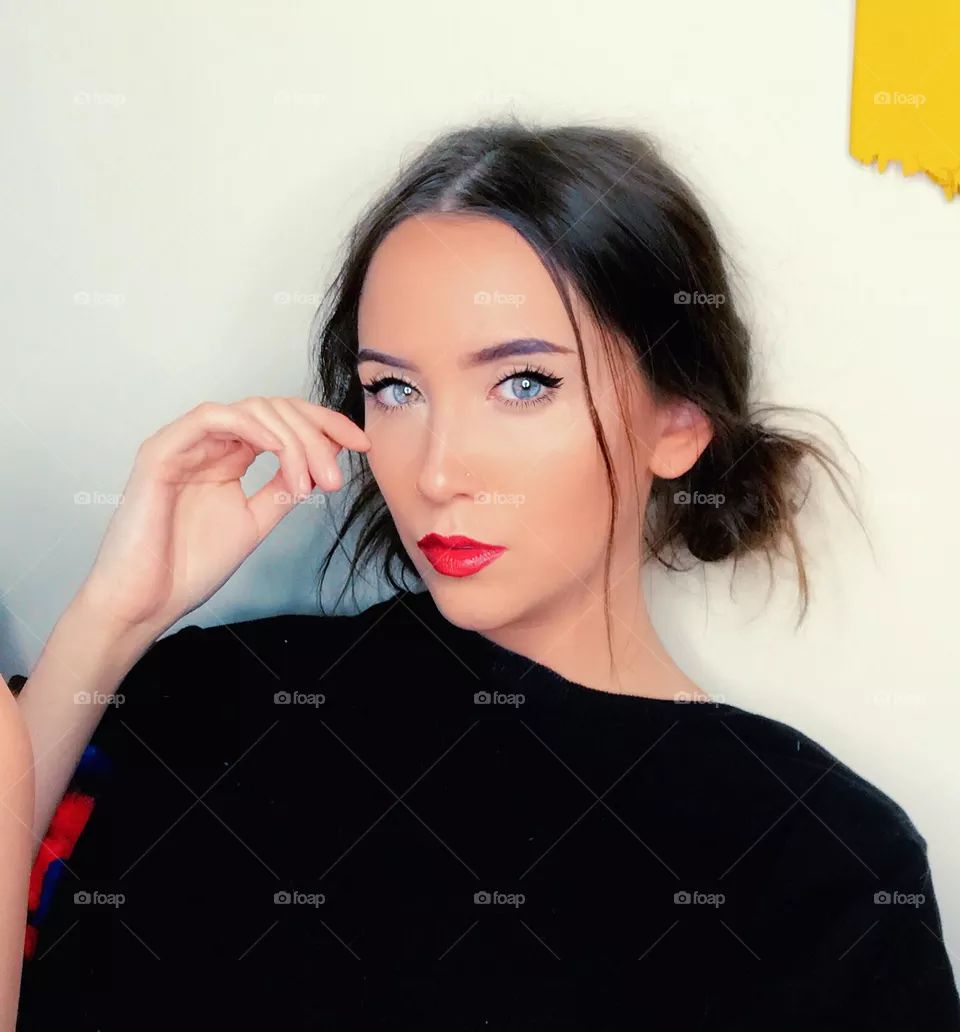 Quick shot of cute model with blue eyes and messy hair