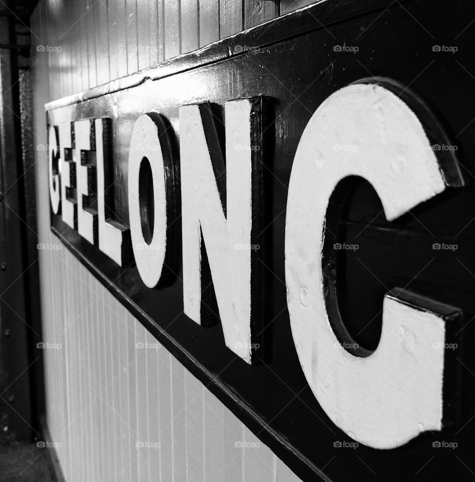 Geelong train station sign in black and white 