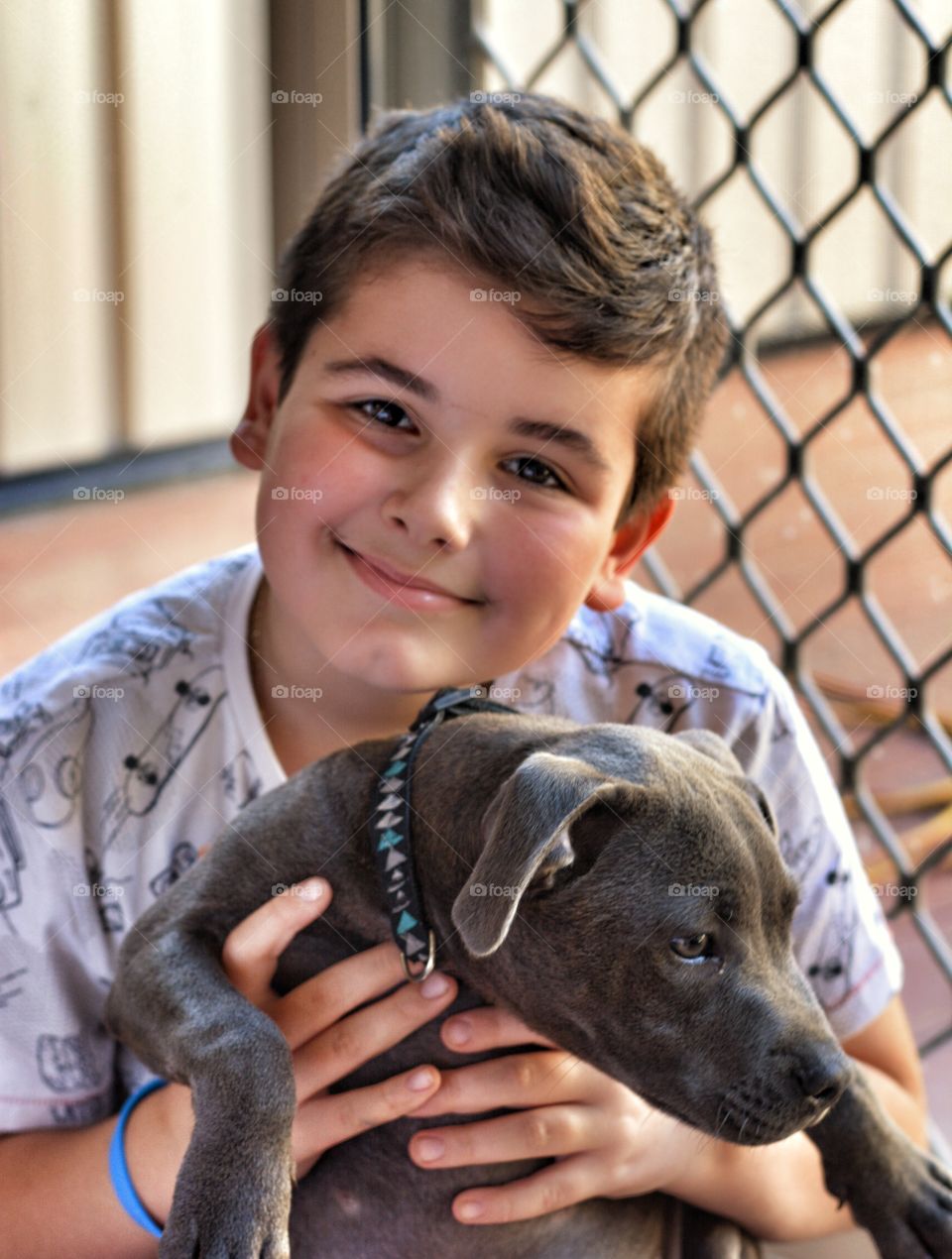 Portrait of a boy with his dog