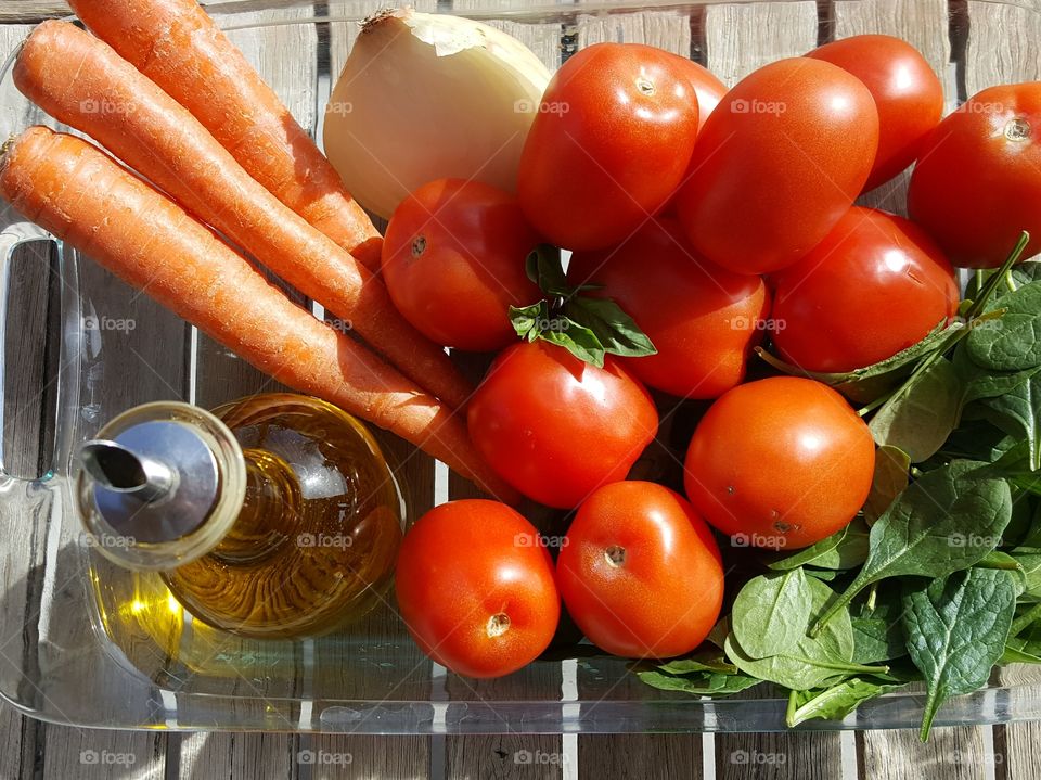 Fresh vegetables for making tomato sauce.