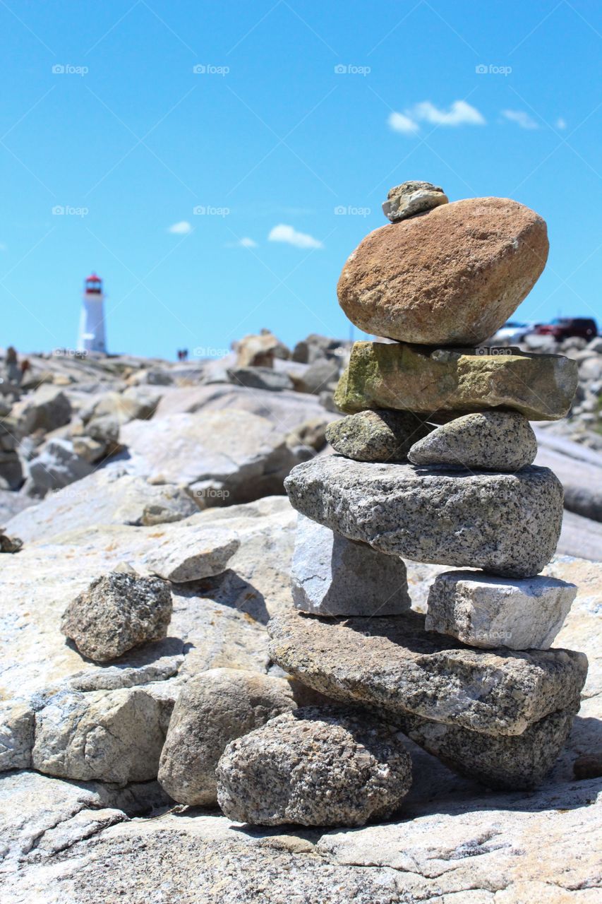 Rock towers at Peggy's cove lighthouse