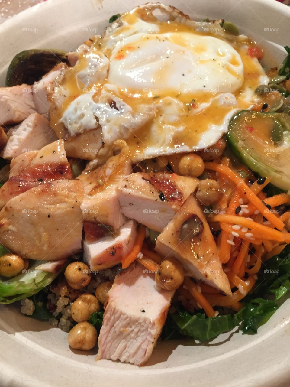 Kale salad with chicken and quinoa and carrots and other good veggies 