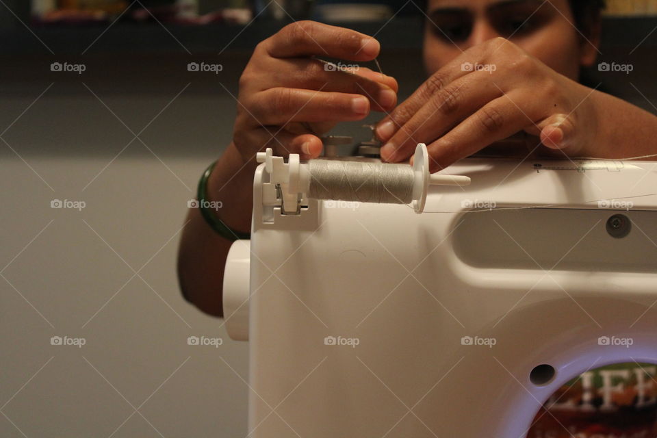 Sewing machine and working woman 