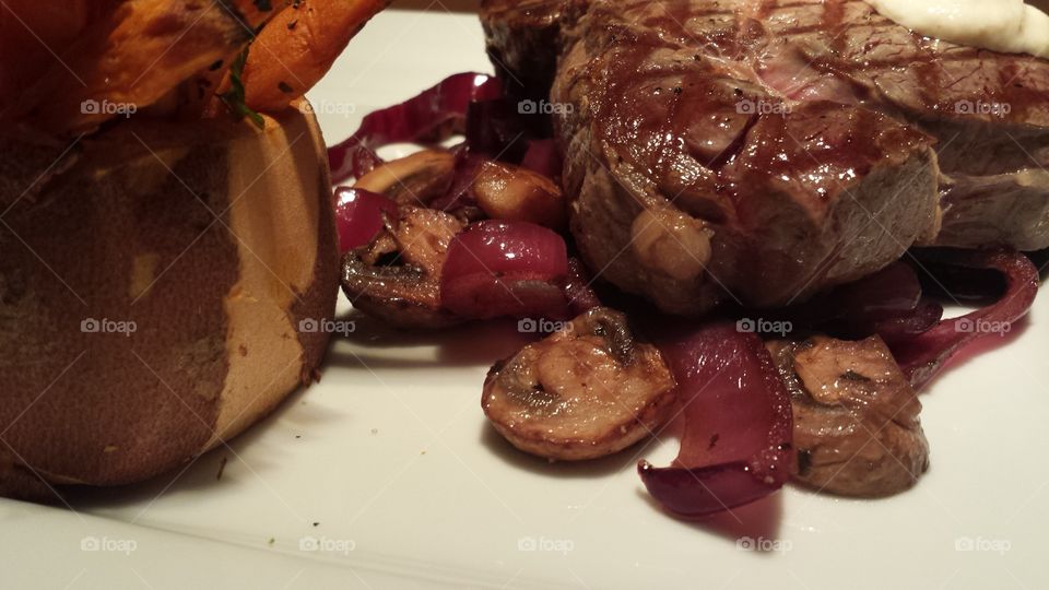 dinner. steak and potatoes with mushrooms
