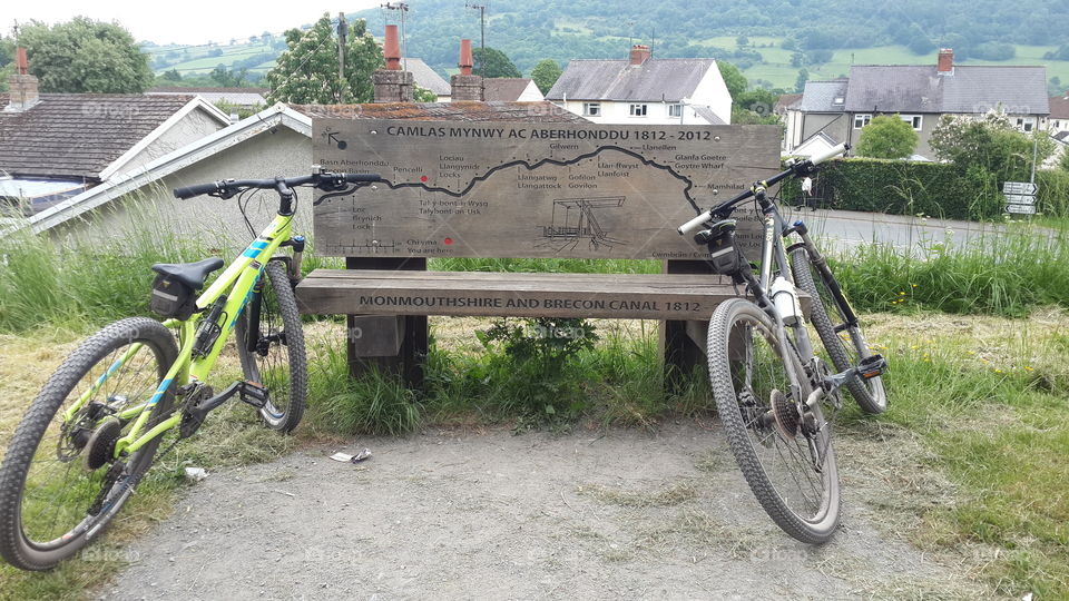 Bikes on a countryside bench