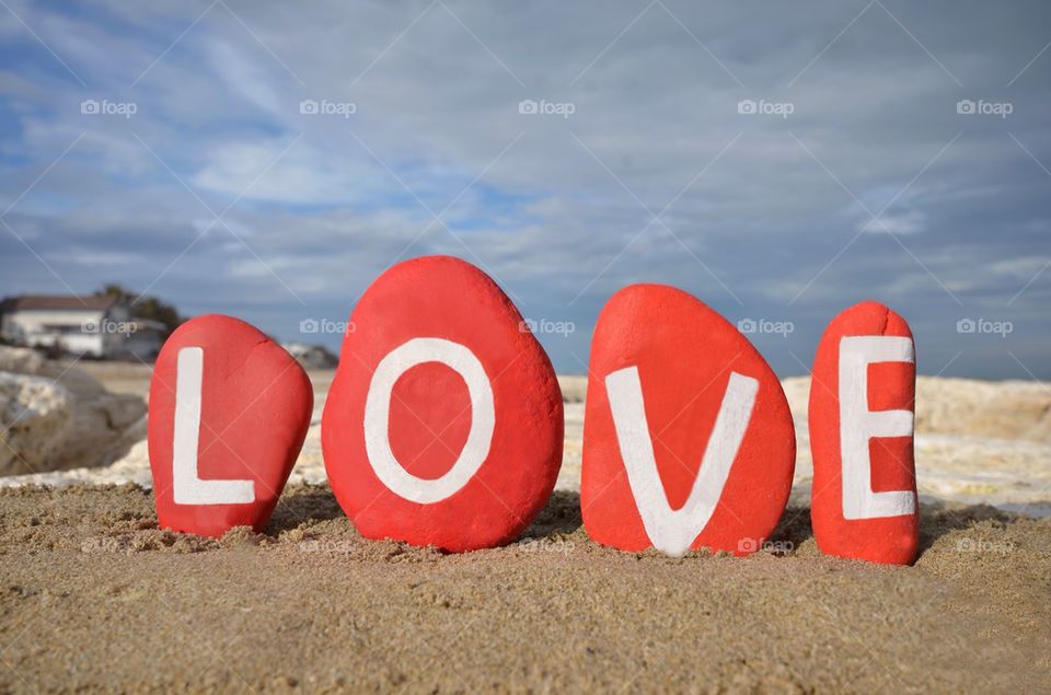 Love Happy Valentines on red stones