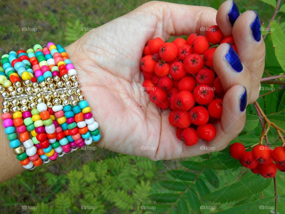 female hand with colour bracelet, beautiful accessories woman