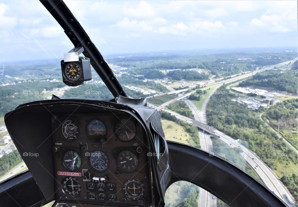 Ride in a helicopter, inside looking out 