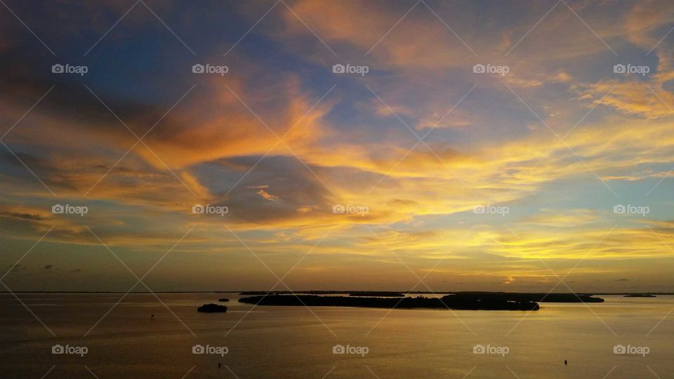spectacular sunset over the Gulf of Mexico  with a few island floating in the ocean