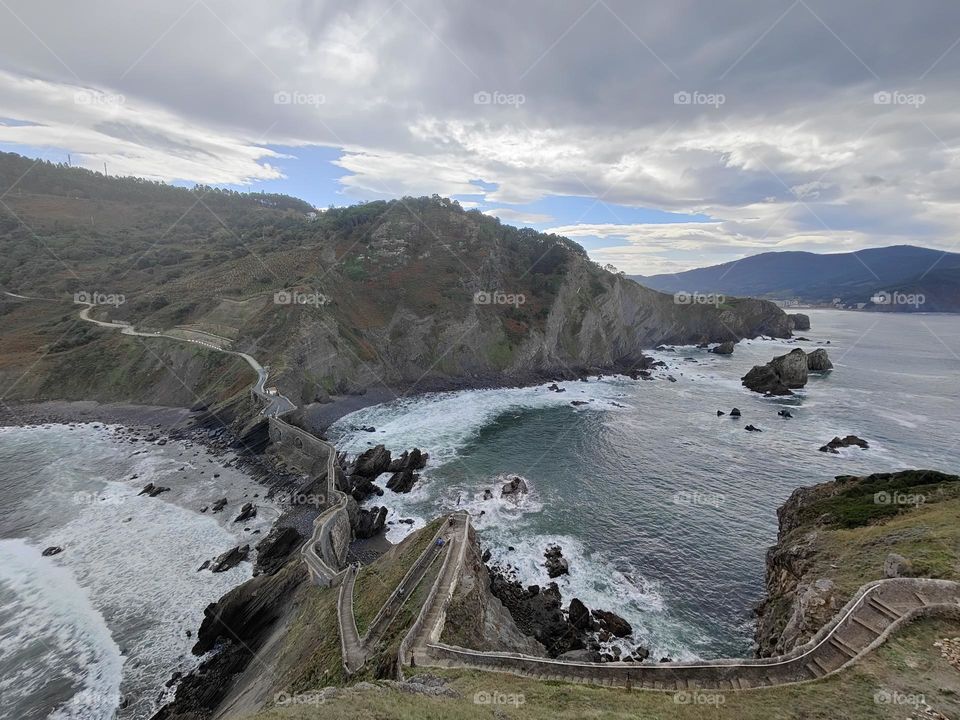 Gaztelugatxe is an islet on the coast of Biscay belonging to the municipality of Bermeo, Basque Country (Spain). It is connected to the mainland by a man-made bridge. On top of the island stands a hermitage that dates from the 10th century.