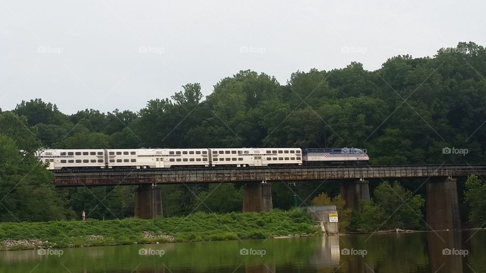 Train on a bridge over water, September 2016.
