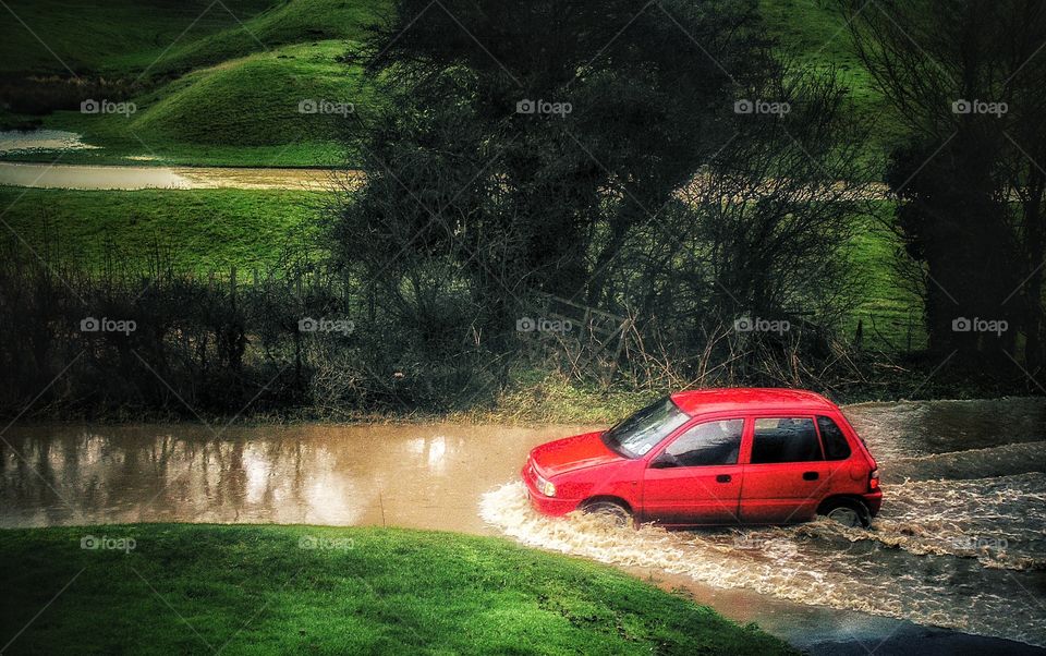 Floods. Flooded road 