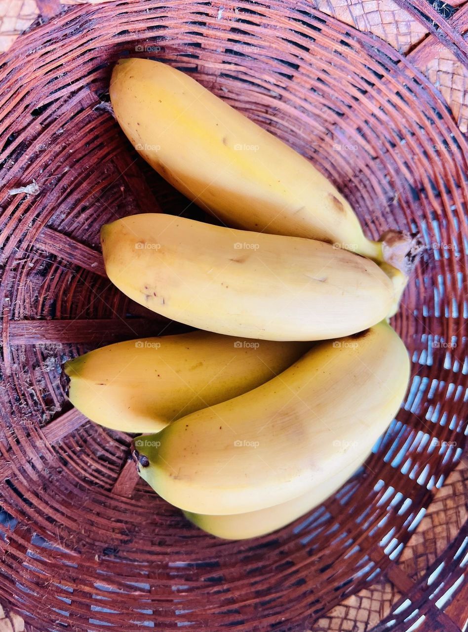 Baby and sweetest bananas 