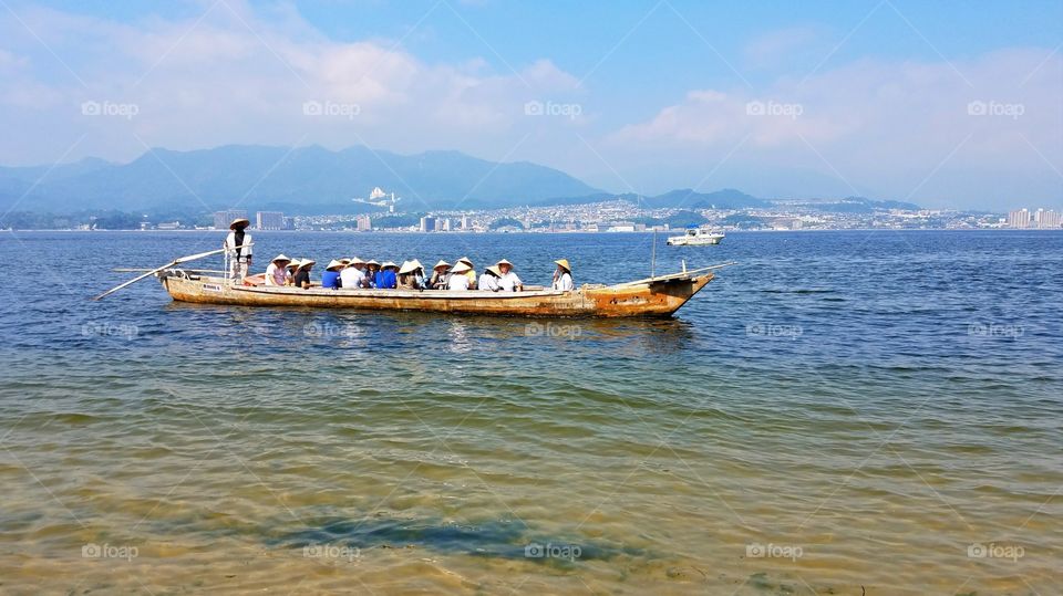 Long-tail boat with people