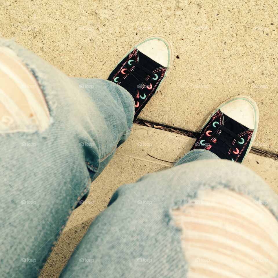 Ripped Jeans and Hightop Sneakers