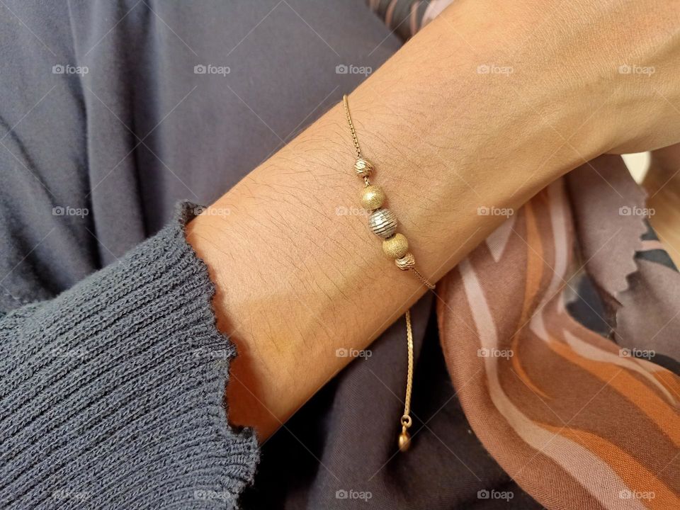Close-up of bracelet on woman's hand
