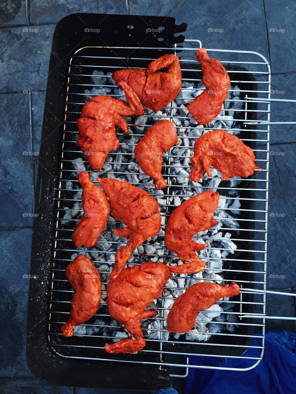 Grilled chicken on barbecue