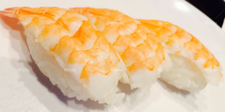 Ebi sushi on white plate