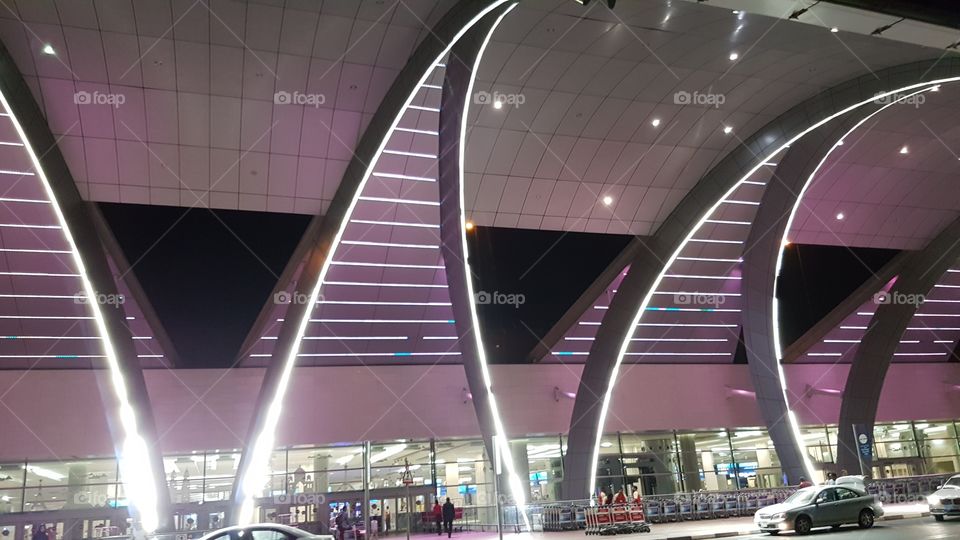 The departure hall in Dubai on a hot summer night.