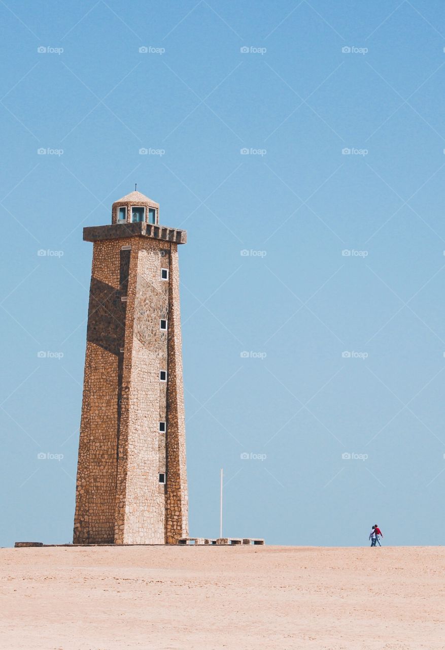 Cabo San Román lighthouse / this foto is taken in Falcon state in Venezuela, in the dark rock beaches, this places is one of the most visited by tourists in Venezuela.