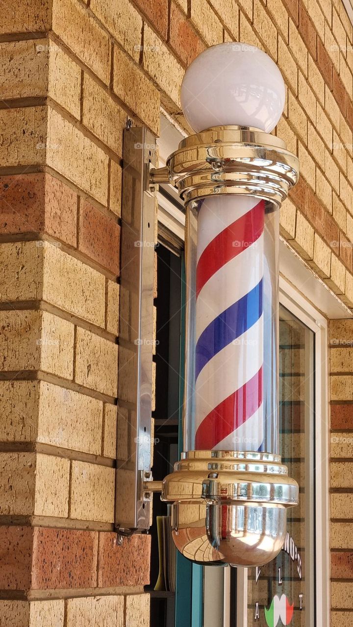 a colorful barbershop post.