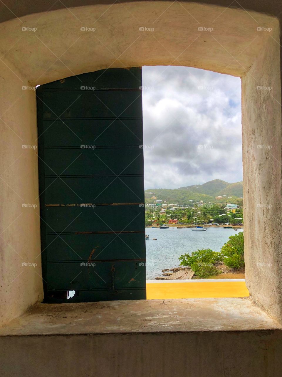 Window half open with water view