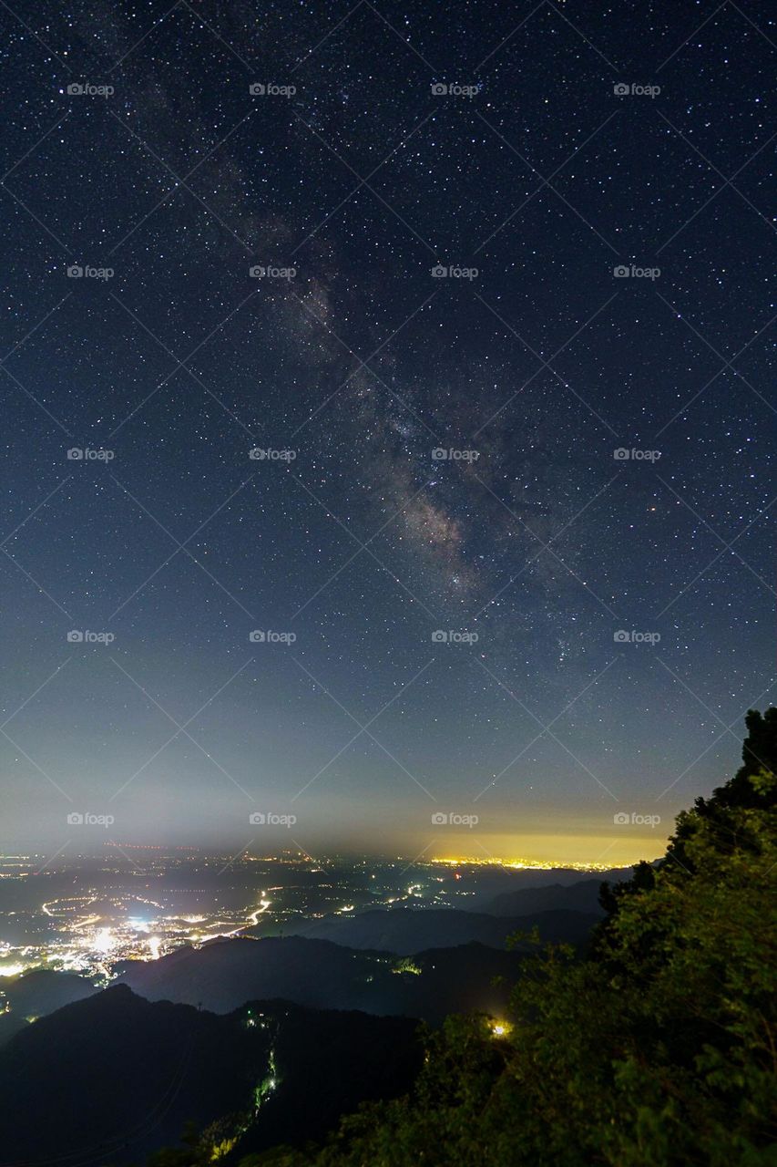 Milky Way Galaxy over a city 