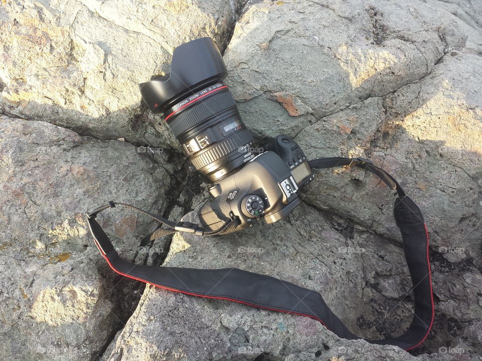 dslr on rocks