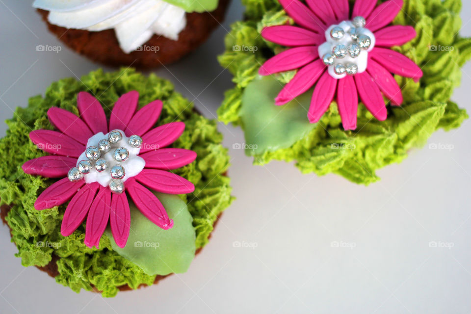 Crazy cupcakes, muffins, a cupcake, a bright cupcake, a cupcake with cream, Cake, sweetness, dessert, cream, bright cake, sugar, delicious cake, flower, cake with flower, color, Fruitcake