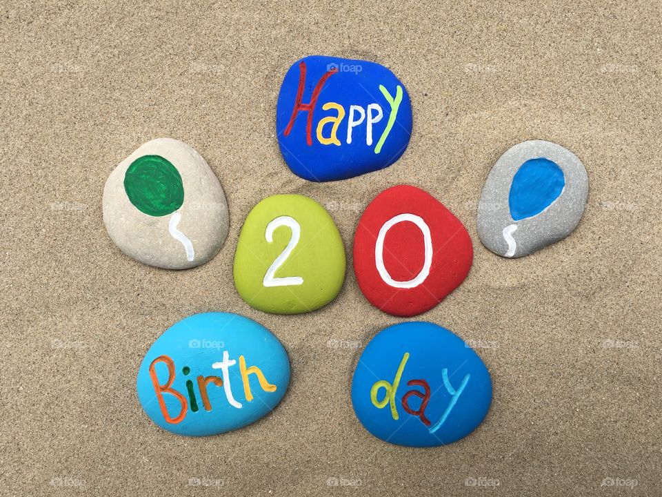 Happy 20 Birthday on colored stones 