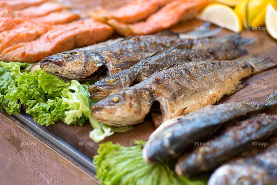 Grilled sea fish on street food festival