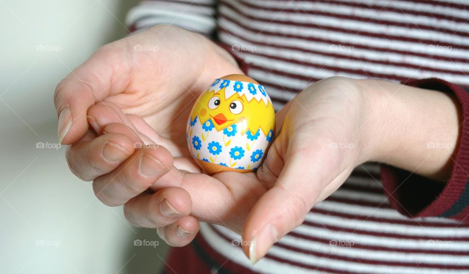 Easter spring holiday, egg in the female hands