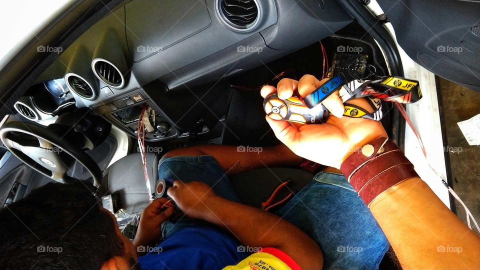 Manutenção, consertos, interior, aparelho de som do carro.